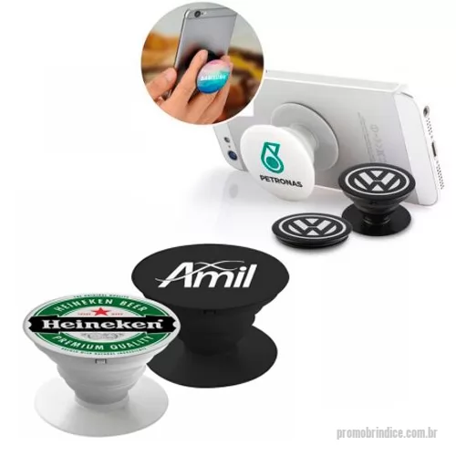 Acessório para celular personalizado - Suporte plástico para celular. Material plástico colorido, possui “disco” anelar retrátil que ao puxá-lo abrirá o encaixe para os dedos e possibilitará a rotação da peça. Base plástica para encaixe, pode ser colada no celular, paredes, vidros, ou onde desejar afim de que possa encaixar o suporte anelar. Suporte e base com adesivos, basta remover a proteção e colar no local desejado.