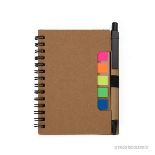 Bloco Anotações personalizado - Bloco de Anotações Ecológico com Autoadesivos e Caneta  Compacto e funcional, este bloco de anotações ecológico é ideal para o dia a dia. Possui cinco blocos autoadesivos com cerca de 25 folhas cada e um bloco pautado com aproximadamente 70 folhas. Acompanha caneta esferográfica de papelão com detalhes em plástico, carga azul e acionamento por clique. O suporte em nylon mantém a caneta sempre à mão, tornando este conjunto uma excelente escolha sustentável para anotações rápidas ou uso profissional.  Especificações:  Altura: 13 cm  Largura: 9 cm  Espessura: 0,5 cm  Área para gravação: 13 cm x 7,4 cm  Peso aproximado: 83 g