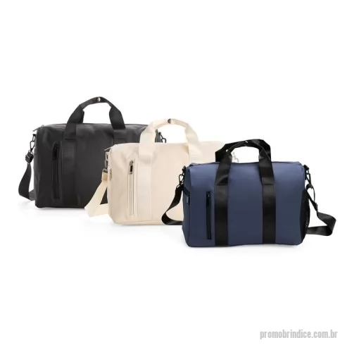Bolsa de Ombro personalizada - Bolsa confeccionada em couro sintético impermeável com fechamento em zíper e capacidade máxima de 20 litros. Apresenta compartimento interno revestido em nylon e bolso dedicado a objetos menores. Possui dois compartimentos externos em tamanhos diferentes, bolso em tela de nylon e três alças: duas de mão e uma transversal removível.