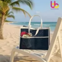 DESCRIÇÃO: PRAIA BAG 42X34CM  EM TELA COM ACABAMENTO  EXTERNO EM SINTETICO  ALÇA 58CM  NO MESMO MATERIAL,  FECHAMENTO COM BOTÃO IMÃ.