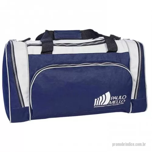 Bolsa de viagem personalizada - Somos fabricantes! Produto disponível em diversas combinações de cores. Produzida em poliéster 600, possui dois bolsos laterais, bolso frontal, alça de mão e de ombro. Medidas 50x31x28. Gravação do logotipo em serigrafia ou bordado.