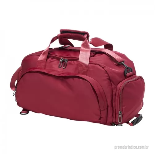 Bolsa Esportiva personalizada - Bolsa esportiva de 32 litros em poliéster resistente à água com cinco compartimentos, sendo três deles exclusivos para tênis, itens molhados e armazenamento das alças de costas . Com alça transversal removível e alça de mãos com suporte de juntura, a bolsa contém alças para as costas ocultas no compartimento inferior, podendo ser transportada como mochila.