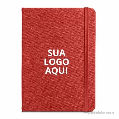 Caderno personalizado - Promova sua marca com o nosso Caderno A5 de Capa Dura em Tecido Poliéster 100% Reciclado (100% rPET)! Com 96 folhas pautadas em papel cor marfim proveniente de gestão florestal sustentável, este caderno é perfeito para quem valoriza o meio ambiente. Possui fita separadora, elástico e um bolso em papel na parte traseira da capa, oferecendo praticidade e organização. Com dimensões de 140 x 210 mm, é ideal para o uso diário, seja no escritório ou em reuniões.