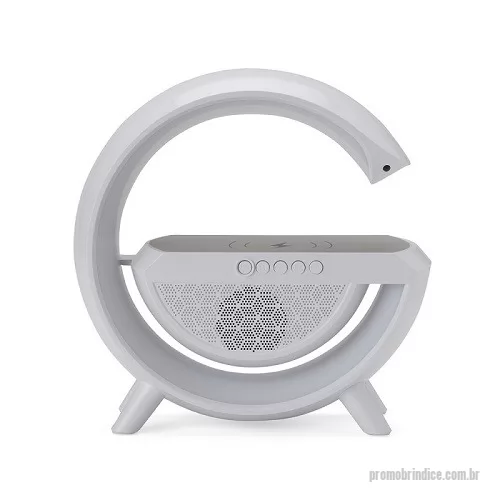 Caixa de Som com Bluetooth personalizada - Caixa de som com carregador por indução e luminária. Possui 6 modos de iluminação, opera nos modos bluetooth, rádio FM, auxiliar P2, USB e TF (cartão MicroSD). Para desfrutar do carregamento por indução (sem fio) é fundamental que o celular possua a tecnologia QI, o produto só armazena bateria para funcionamento próprio, para funcionar a indução precisa estar conectado a uma fonte de energia.