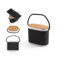Caixa de som em bambu e poliéster 100% reciclado (rPET), com carregador wireless super-rápido na parte superior. Transmissão sem fios BT 5.3 e carregamento wireless com potência máxima de 15W, permitindo um carregamento super-rápido. Com potência son