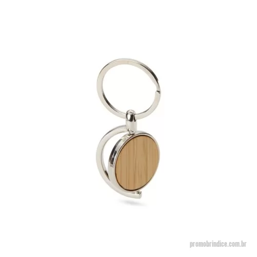 Chaveiro personalizado - Chaveiro Metálico com Detalhe em Bambu – Design Giratório e Sofisticado  Organize suas chaves com estilo e funcionalidade! Este chaveiro em metal de formato circular combina resistência e elegância, ideal para quem busca um acessório prático e sofisticado. Seu design giratório traz um toque moderno, enquanto a frente com acabamento em bambu natural adiciona charme e exclusividade. O verso liso é perfeito para personalização.  Especificações:  Altura: 7,4 cm  Largura: 3,5 cm  Espessura: 0,5 cm  Peso aproximado: 21 g  Área para gravação (CxL): 2 cm x 1,5 cm  Perfeito como brinde corporativo ou presente elegante, une praticidade e bom gosto no dia a dia.