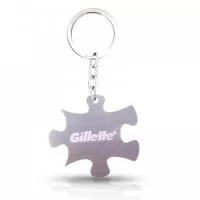 Chaveiro em aço, desenvolvido para a Gillette, efeito fosco, modelo com recorte especial e logo em baixo relevo.