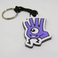 Chaveiro Emborrachado Gravação em Alto relevo com a logo do cliente.  Desenvolvimento de formato e marca específica. Acabamento em cordão de nylon e argola (ou em corrente metálica e argola). Faça seu orçamento.