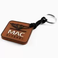Chaveiro Emborrachado Gravação em Alto relevo com a logo do cliente.  Desenvolvimento de formato e marca específica. Acabamento em cordão de nylon e argola (ou em corrente metálica e argola). Faça seu orçamento.