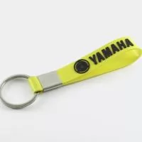 Chaveiro Emborrachado Gravação em Alto relevo com a logo do cliente.  Desenvolvimento de formato e marca específica. Acabamento em cordão de nylon e argola (ou em corrente metálica e argola). Faça seu orçamento.