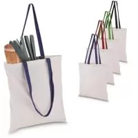 Sacola em algodão cru 140g/m² com alça colorida em algodão liso. Alça com altura de 29 cm, ideal para transporte.