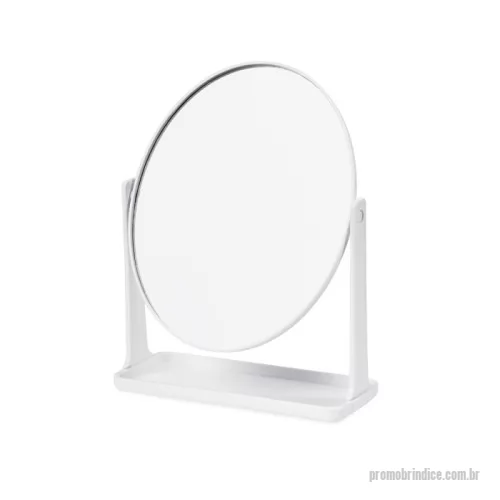 Espelho personalizado -  Espelho de mesa giratório com face única sem aumento em formato oval. Possui estrutura em plástico e base com espaço para organizar pequenos objetos.
