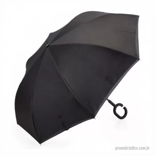 Guarda chuva personalizada - Guarda-chuva invertido com forro interno. Tecido de nylon impermeável preto, possui um mecanismo inovador permitindo que o usuário não se molhe ao entrar e sair de ambientes devido sua abertura invertida, quando feito o movimento para fechar as varetas inverterão para cima criando um formato circular impedindo a chuva de atingir o usuário, podendo “segurar” a chuva enquanto entra/sai de um ambiente e depois virando o guarda-chuva irá escorrer a água. Forro interno para preservação das 8 varetas, evitando contato com a água e assim prolongando seu tempo de uso sem enferrujar. Ao impulsionar o fechamento invertido fica mais rápido e prático o modo de secar e ser guardado, pode ser apoiado no chão que permanecerá em pé para escorrer a água. Pegador plástico fosco em formato C, botão acionador vermelho e fita com velcro(contorno marrom) para lacre. Tamanho total aproximado: Fechado: 79,5 cm x 9,4 cm – Aberto:  ø 106 cm.