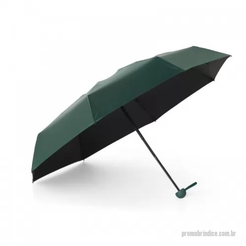 Guarda chuva personalizada - Guarda-chuva manual cápsula em poliéster de impacto impermeável e proteção UPF 50. Possui tecido interno em vinil com 8 varetas e estrutura em aço, pegador, botão de abertura e e alça de Nylon. Acompanha estojo protetor com alça.