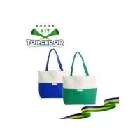 Sacola confeccionada em lona 356g/m² com revestimento interno em poliéster, bolso frontal aberto e duas alças com costura interna. Altura : 30 cm Largura : 39 cm Profundidade : 10cm Peso aproximado g : 187