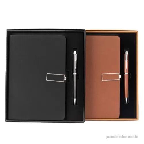Kit executivo personalizado - Kit executivo composto por dois itens: uma caderneta e uma caneta. A caderneta possui capa dura em couro sintético texturizado com fecho magético e alça metálica com detalhe em couro sintético, marca-páginas em fita de cetim e aproximadamente 120 folhas marfim pautadas. A caneta metálica conta com clipe, acionamento por rotação e carga esferográfica preta de 1,0mm. Acompanha caixa em papelão com berço removível em espuma para acomodação da caneta.