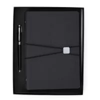 Kit executivo: caneta metálica 1.0mm preta e caderno fichário ~96 folhas removíveis, 6 anéis, capa dura em couro sintético.