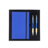 Kit com caderneta (capa dura papelão, ~82 folhas pautadas), caneta e lapiseira com detalhes em bambu.