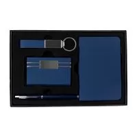 Kit: caderneta capa PU ~76 folhas marfim, caneta metálica carga preta 0,7mm, porta-cartões inox com PU, chaveiro PU texturizado.
