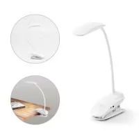 Luminária de mesa portátil em ABS e com LED COB. A luminária tem mola, braço flexível e botão tátil com 3 modos de luz (fraco, médio e forte). Autonomia até 20 horas. Incluso cabo USB de 1 metro para carregamento.