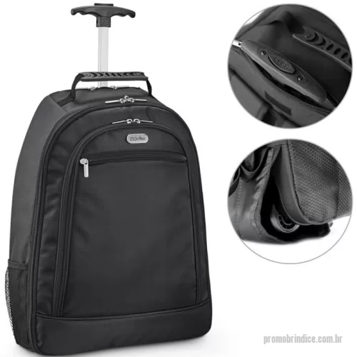 Mochila com carrinho personalizada - Mochila trolley para notebook fabricada em material resistente, com duas rodas para facilitar o transporte. Possui compartimento principal almofadado, adequado para notebooks de até 15.6 polegadas. Conta com um segundo compartimento interno forrado e equipado com diversos bolsos para organização. Inclui bolso frontal com fechamento em zíper e bolsos laterais em tecido respirável. O sistema trolley dispõe de protetor de rodas, alças ajustáveis e acolchoadas, além de uma pega extensível de metal com mecanismo de mola, que pode ser estendida até 530 milímetros. Apresenta ainda uma placa metálica removível com fixação magnética, ideal para personalização. Capacidade total de 24 litros.