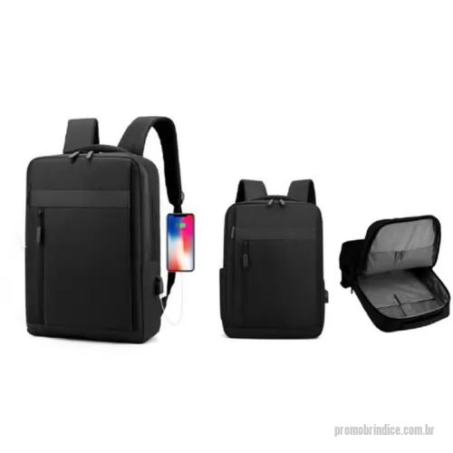 Mochila para notebook personalizada - Mochila p/ Notebook em tecido poliéster. Parte externa: 2 Bolsos frontais com ziper; 1 Bolso lateral; Alça de mão e ombro acolchoadas, engate para mala de viagem Conector USB externo na lateral. Parte interna: Compartimento acolchoado p/ notebook de 39x27cm; Tamanho total do Notebook - 15,6¨ 2 Porta Objetos; 2 Porta Canetas.