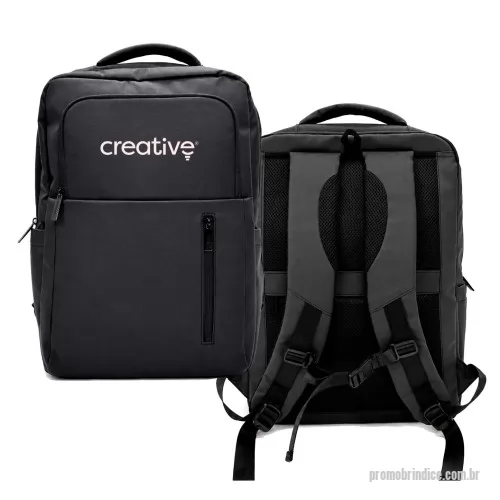 Mochila para notebook personalizada - A Mochila Executiva para Notebook oferece espaço e praticidade para transportar equipamentos, acessórios e objetos pessoais. Com capacidade aproximada de 23,2 litros, possui compartimento principal com cinco divisórias internas, incluindo duas teladas.  O espaço para notebook conta com faixa elástica e fechamento em velcro para auxiliar na fixação do equipamento. O modelo também possui bolso frontal com seis divisórias e bolso telado com zíper, além de dois bolsos laterais com elástico e bolso traseiro. As costas acolchoadas, o encaixe para mala e as alças reguláveis facilitam o transporte durante a rotina de trabalho, estudos e viagens.  Características: Capacidade: aproximadamente 23,2 litros; Compartimento principal com cinco divisórias, sendo duas teladas; Divisória para notebook com faixa elástica e fechamento em velcro; Bolso frontal com seis divisórias e bolso telado com zíper; Bolso frontal inferior em formato vertical; Bolso traseiro com fechamento por zíper; Dois bolsos later