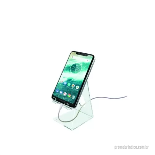 Porta celular personalizada - Suporte para celulares e smartphones fabricado em acrílico 100% virgem!     Com um design atrativo, simples e moderno, proporciona maior comodidade no uso do seu aparelho.  Prático, discreto e bonito, não ocupa espaço. A maneira mais eficaz de manter seu celular sempre perto de você.     Mais conectado! Com o suporte para celular você fica com as mãos livres para gesticular numa chamada de vídeo.  Mais confortável! Assista a vídeos sem ter que segurar o celular nas mãos.  Mais organização! Possui abertura para passagem do fio do carregador, você pode deixar seu aparelho carregando no suporte sobre a mesa, bancada, etc.  Mais versatilidade! Uma única medida que se adapta à diversos aparelhos. Utilize seu aparelho tanto horizontal quanto verticalmente.  Mais segurança! Acompanha gotas de silicone na base, não escorrega em superfícies lisas.