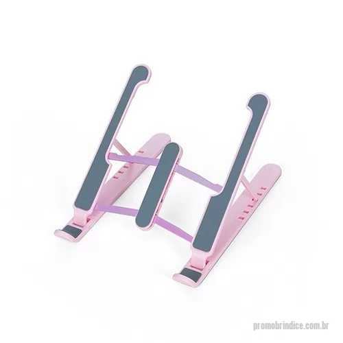 Suporte Laptop personalizado - Suporte retrátil para notebook com ângulos reguláveis. Com “esteiras” de silicone antideslizantes, o suporte contém seis posições para regulagem que se adaptam conforme a necessidade do usuário, promovendo um maior conforto e aperfeiçoando a ergonomia durante sua utilização. Sua estrutura de corte aberto torna a circulação de ar excepcional, acelerando o resfriamento do notebook e proporcionando uma dissipação de calor ideal ao eletrônico.