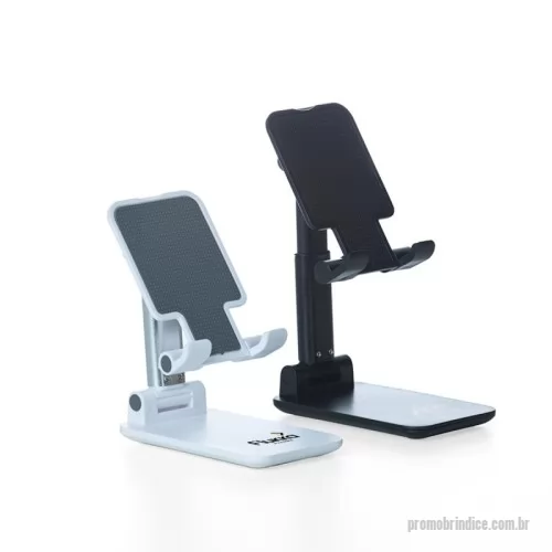 Suporte para celular personalizado - Suporte retrátil para celulares e tablets. Produzido em plástico com haste de alumínio, o suporte possui ângulo ajustável e extensão de altura. Seu tapete de silicone antiderrapante garante a estabilidade do eletrônico sem machucar sua traseira. As “canaletas” também revestidas de silicone encaixam perfeitamente ao eletrônico sem bloquear a visualização da tela, além do espaçamento ideal que permite o carregamento do celular/tablet no suporte sem bloquear a visão ou atrapalhar sua estadia. Com base de silicone antiderrapante, o suporte permanece fixo e estável nas mais diversas superfícies.