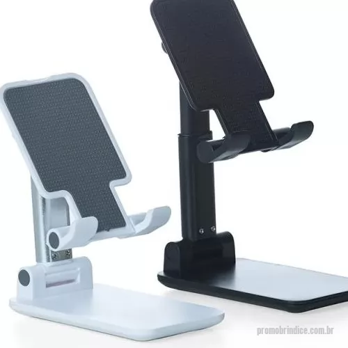 Suporte para celular personalizado - Suporte retrátil para celulares e tablets. Produzido em plástico com haste de alumínio, o suporte possui ângulo ajustável e extensão de altura. Seu tapete de silicone antiderrapante garante a estabilidade do eletrônico sem machucar sua traseira. As “canaletas” também revestidas de silicone encaixam perfeitamente ao eletrônico sem bloquear a visualização da tela, além do espaçamento ideal que permite o carregamento do celular/tablet no suporte sem bloquear a visão ou atrapalhar sua estadia. Com base de silicone antiderrapante, o suporte permanece fixo e estável nas mais diversas superfícies.