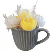 Caneca de cerâmica com carias velas individuais, que se retira, acende (são também velas  flutuantes que podem ser colocadas acessas em um copinho com agua) e depois se reaproveita a CANECA para o chá ou café